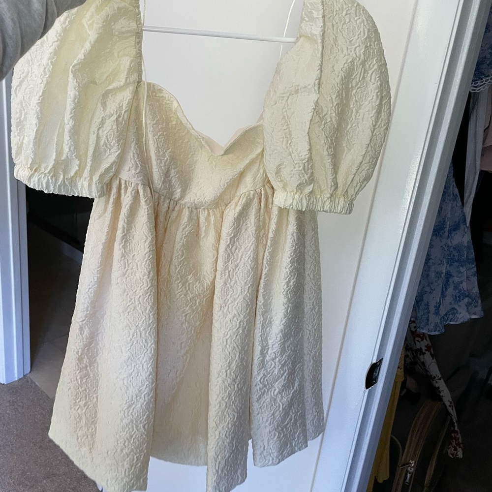 Pale yellow babydoll dress